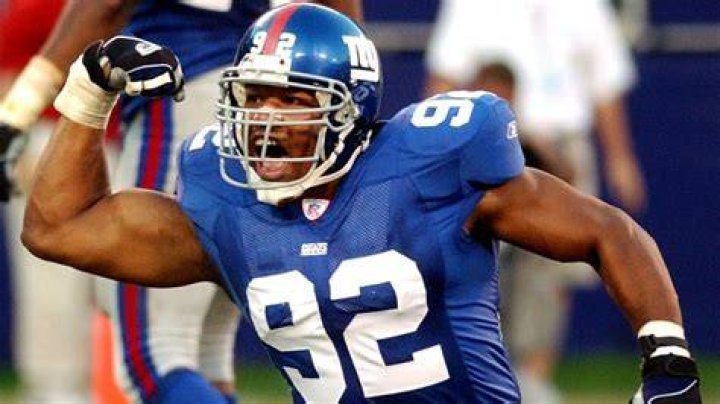 What position did Michael Strahan play with the Giants?